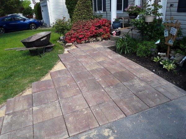 Front porch stone paver patio laying pavers in progress