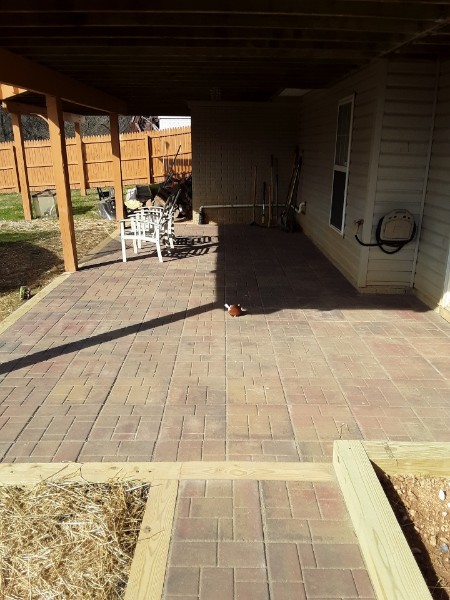 Timber framed stone pavers back patio