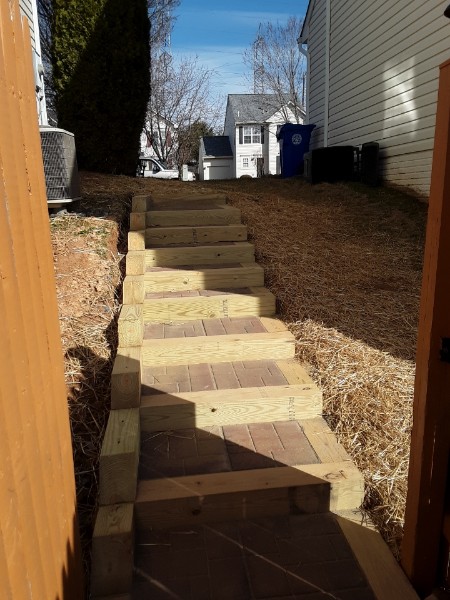 Timber framed stone pavers stairway